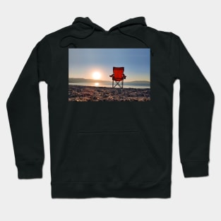 Sunrise behind the chair Hoodie